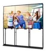 Two-by-two video wall carried on a twin-column floor stand, shown as a floor-stand installation example