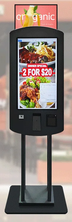 Black freestanding ordering kiosk with a portrait touchscreen and a header sign panel above it, carried on twin poles over a square base
